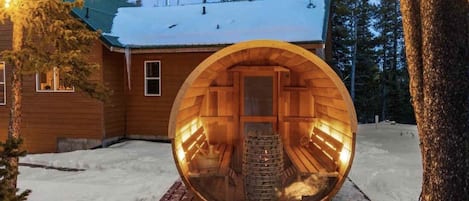 Relax in a private Barrel Sauna. Glass back reveals your natural surroundings.