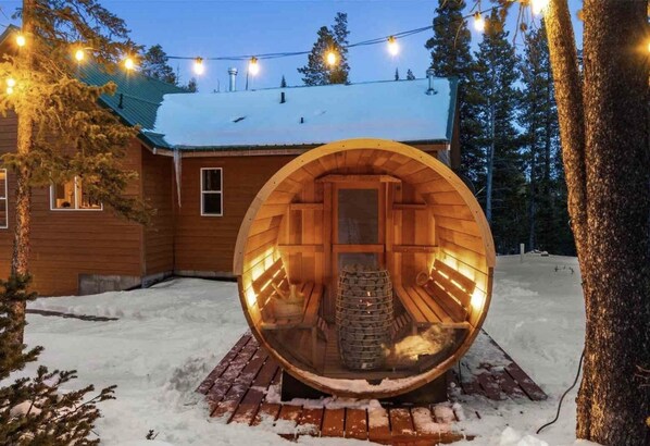 Relax in a private Barrel Sauna. Glass back reveals your natural surroundings.