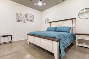 Beautiful custom wooden king size bed features Beautyrest Harmony Lux mattress.