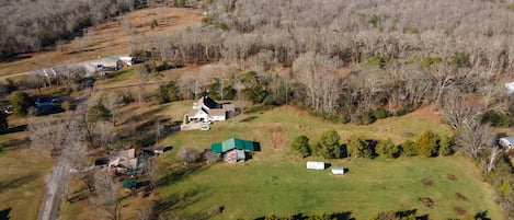 Large private property with stocked pond and less than 1/4 mile to Harrison Bay State Park