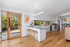 Kitchen and breakfast bar