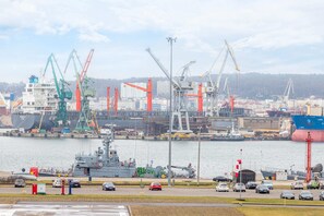 A scenic view of the nearby port and industrial area, highlighting the apartment's location.