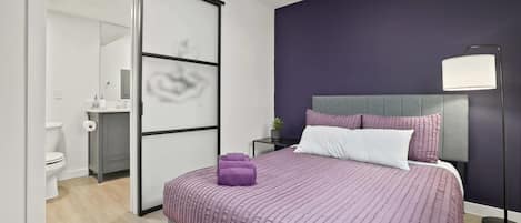 This unit has one queen bedroom set with luxurious bed linens and urban artwork.