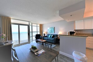 Spacious Living Room and Full Kitchen 