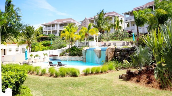 Beautifully Landscaped Grounds boasts multiple pools