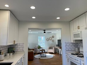 Kitchen looking into living room.