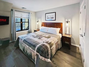 Primary bedroom with a king bed, mtn views and an en suite bathroom