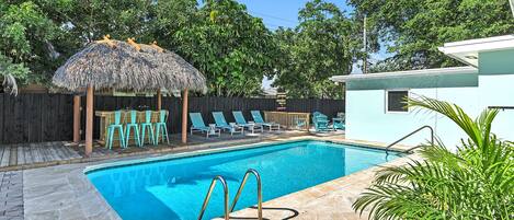 Bask in the sun by the private pool, dine under the cozy tiki hut, and enjoy the secluded tropical ambiance.