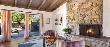 You'll love our living room with its gorgeous vaulted ceiling and gas fireplace.