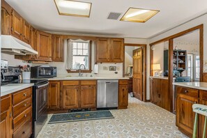 Kitchen area and door to the 3/4 bathroom