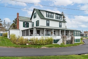 Front view of the house, parking at each side of the house