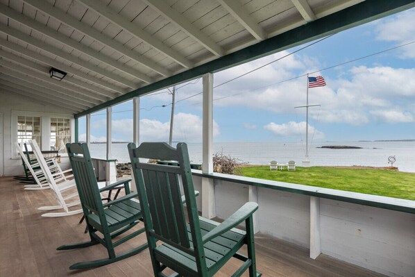 Enjoy this covered porch with amazing ocean views and sunsets