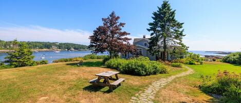 Easily access the Bunkhouse, Annex, and outdoor amenities on a stone path from the Cottage