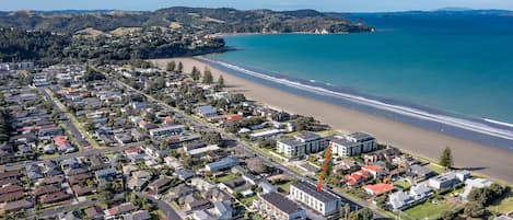 Aerial view of Orewa Beach showing the location of the townhouse.