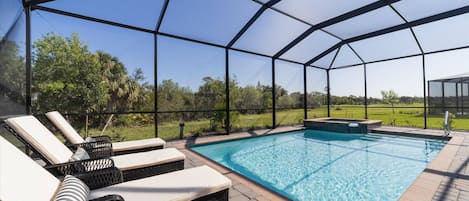 Soak up the Florida sunshine overlooking the pool and the 9th hole on the golf course