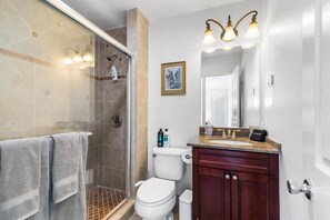 Spacious full bathroom, providing comfort and convenience for your stay.