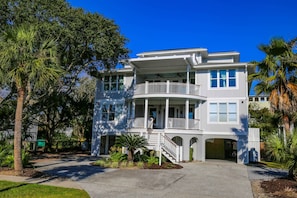 Sea Gem is a 3-story home across the street from the Isle of Palms beach.