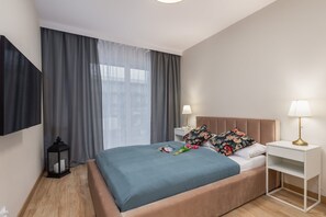 A bedroom with a double bed and soft bedding to encourage relaxation.