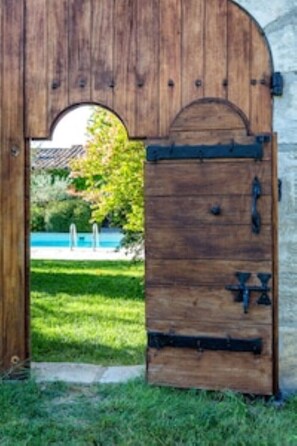 Gate between the pool and the park.
