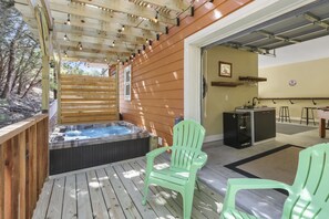 Hot tub located off the garage turned gameroom!