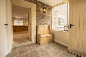 Main entrance hallway leading to the kitchen