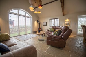 Lalo, near Thirsk: Sitting area with comfortable seating overlooking the countryside