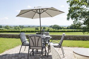Lalo, near Thirsk: Patio area leading to the garden