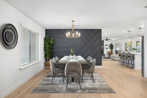 Large dining room with seating for 8. 