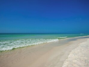 Walk to the emerald coast waters!