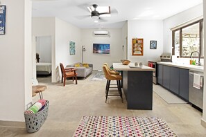 Casa Prieta unit. Fully stocked kitchen with stove, dishwasher, microwave. Flatscreen TV in the lounge area