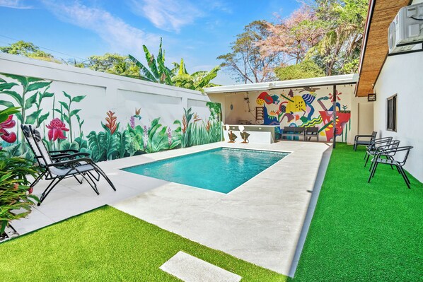 Swim and relax by the pool by day, cook and entertain in the outdoor kitchen by night