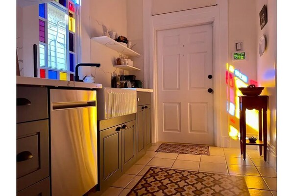 Our kitchen becomes a rainbow of colors when the sunlight hits the stained glass