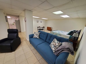 Big open space with Queen bed, dining area, queen sofa bed, recliner and TV