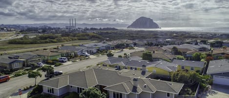 Sand Castle on the Beach - A perimeter of sandy beach and indigo blue ocean engulf this exclusive Morro Bay estate vacation home.