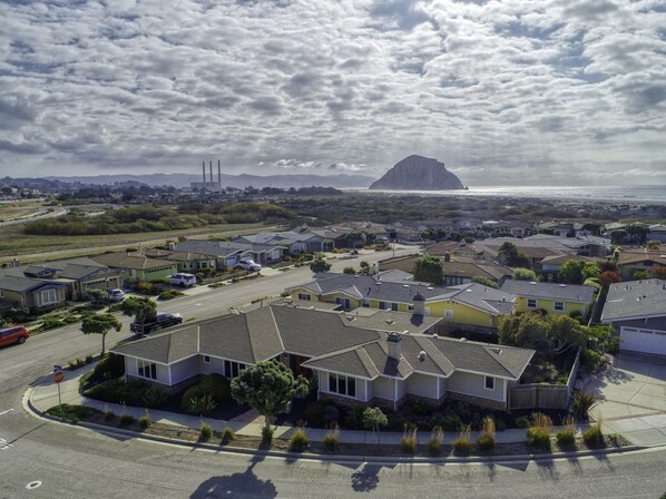 Sand Castle on the Beach - A perimeter of sandy beach and indigo blue ocean engulf this exclusive Morro Bay estate vacation home.