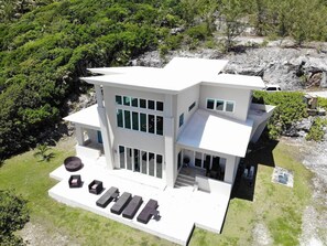 This spacious and 3200-square-foot villa features an abundance of glass to capitalize on the breathtaking views