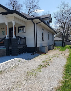 The front driveway is located on the west side of the property.