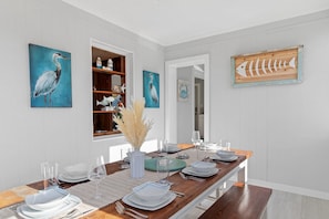 Dedicated dining room - plenty of seating, dishes, and light to enjoy meals