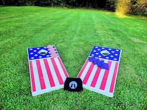 Outdoor space for yard games! We have Cornhole and Bocci ball! Come have fun!