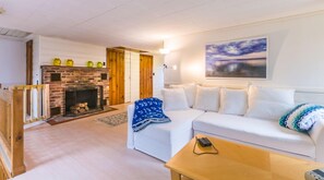 Beautifully updated Living area with fireplace.