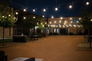 Courtyard bistro lighting at night!