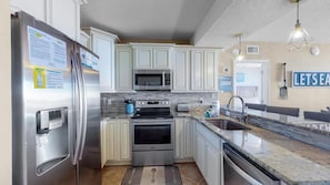 With everything at your fingertips, stainless steel appliances and stylish upgrades entice the chef in you to get creative in this culinary paradise.