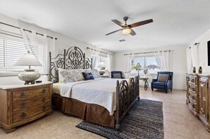 The master suite on the 3rd level with a king bed.