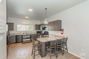 A fully-equipped KITCHEN for preparing meals at home