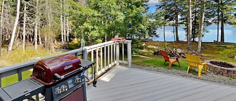 Gas grill on the deck just off the kitchen