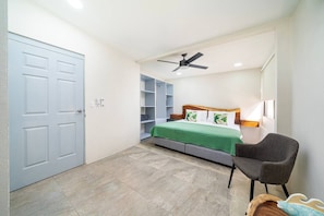 Master bedroom with a king size bed, ensuite bathroom and ample closet space.
Choose between air conditioning or ceiling fan for a more natural breeze.