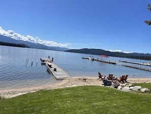 The unit shares the beach with the Main Cabin, located in front of the garage.