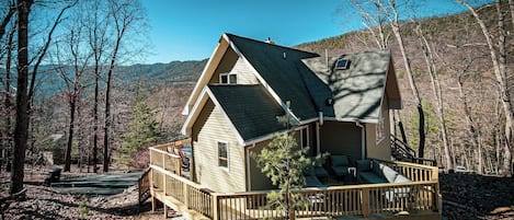 The Back Patio & Back Deck against the beautiful mountain backdrop.