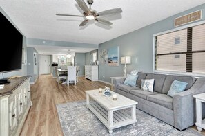 Living room and dining room leading to kitchen
