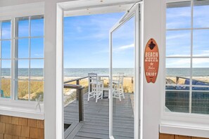 View to the Deck and beach access is steps away